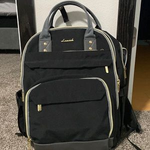 Lovevook black locking backpack with 8 zipper pockets.